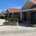 Panoramic view from a private waterfront deck directly overlooking the turquoise sea at our bonaire rentals on the water